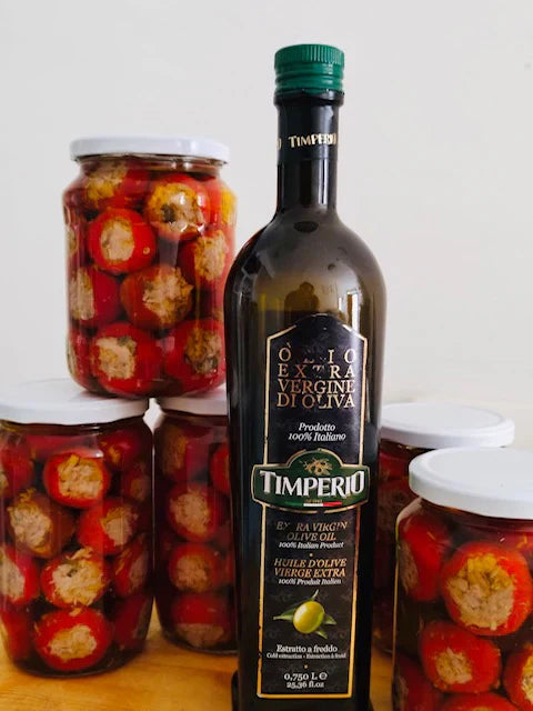 Pickled cherry peppers stuffed with anchovies, tuna, and capers