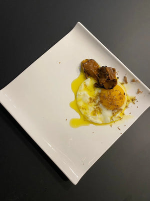 Fried eggs with Black truffles slices Recipe – Timperio